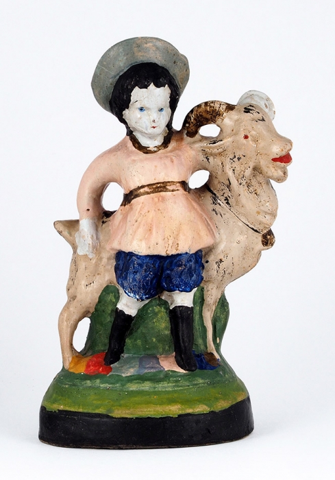 Скульптура «Мальчик с козликом». Россия, Гжель, кустарные артели. 1900-е. Керамика, холодные эмали. Размер 22x13x9,5 см.
